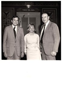 ["The image depicts Dewey Bartlett standing with Henry Bellmon and Paula Unruh in front of the Foreign Relations Office"]