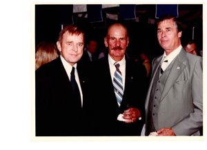 ["The image depicts Dewey Bartlett, Colonel Phil Yelkel, and Eldon D. Rudd"]