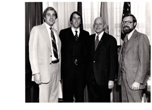 ["The image depicts Dewey Bartlett standing with Bob Dotchin (minority staff director of Small Business Committee), Stan Inwardy (minority staff counsel Small Business Committee) and Mike Roush (economist)"]