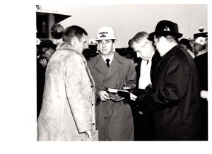 ["The image depicts Dewey Bartlett standing with Brigadeer General H. R. Parfitt, Mayor La Fortune, and Ed Edmondson"]