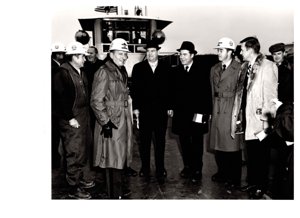 ["The image depicts Dewey Bartlett standing with John Maples, Colonel Pinkey, Harold Scoggins, Ed Edmondson and Brig. Gen. Parfitt"]